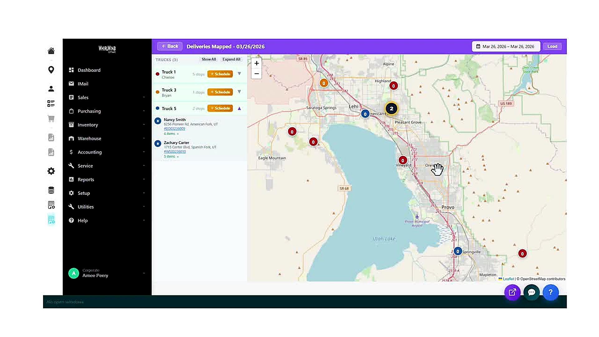 The Deliveries Mapped view for 03/26/2026 showing three trucks with stop counts and a geographic map of delivery locatio